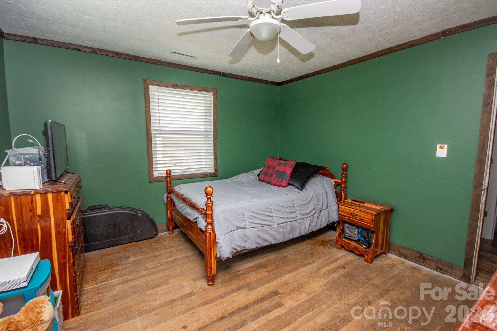 120 Mitch Road Union Grove, NC 28689 - Photo 15 of 24 a bedroom with a bed and a window