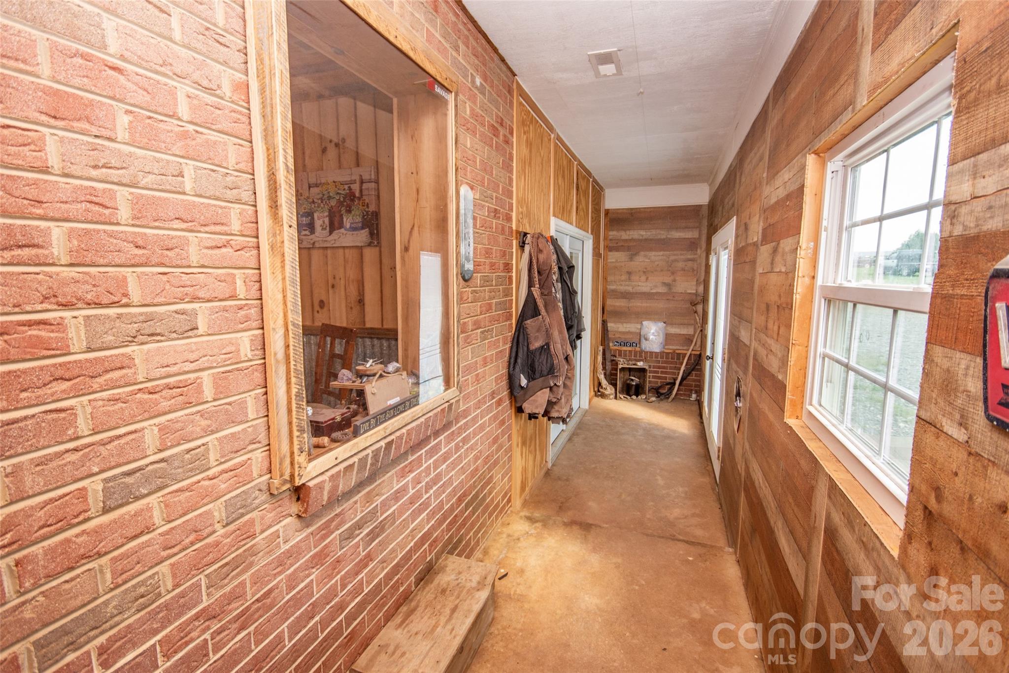 120 Mitch Road Union Grove, NC 28689 - Photo 18 of 24 a view of a room with wooden floor and windows