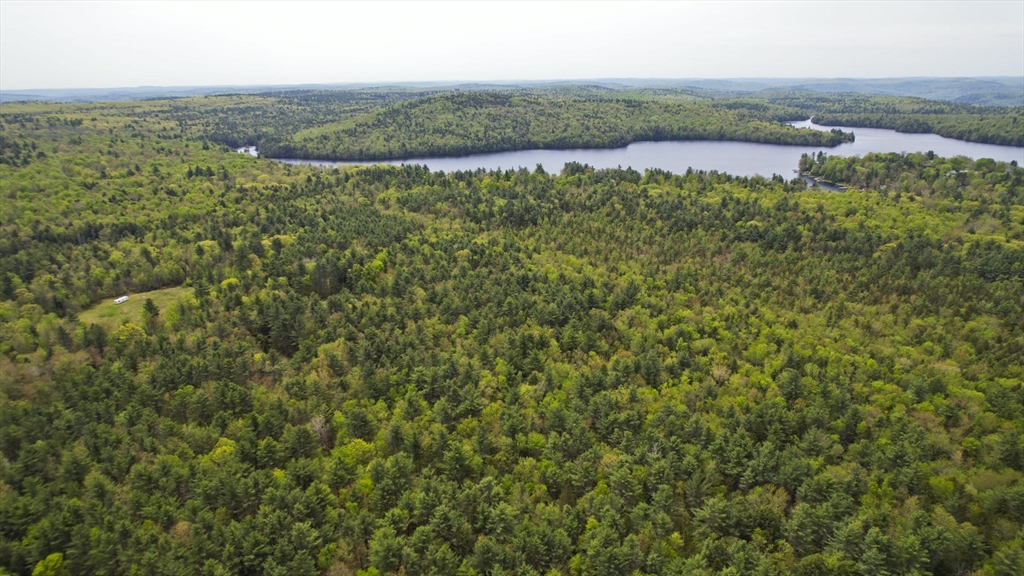 0 Curtis Hall Road Blandford, MA 01008 - Photo 13 of 17 an aerial view of residential houses with outdoor space and trees around