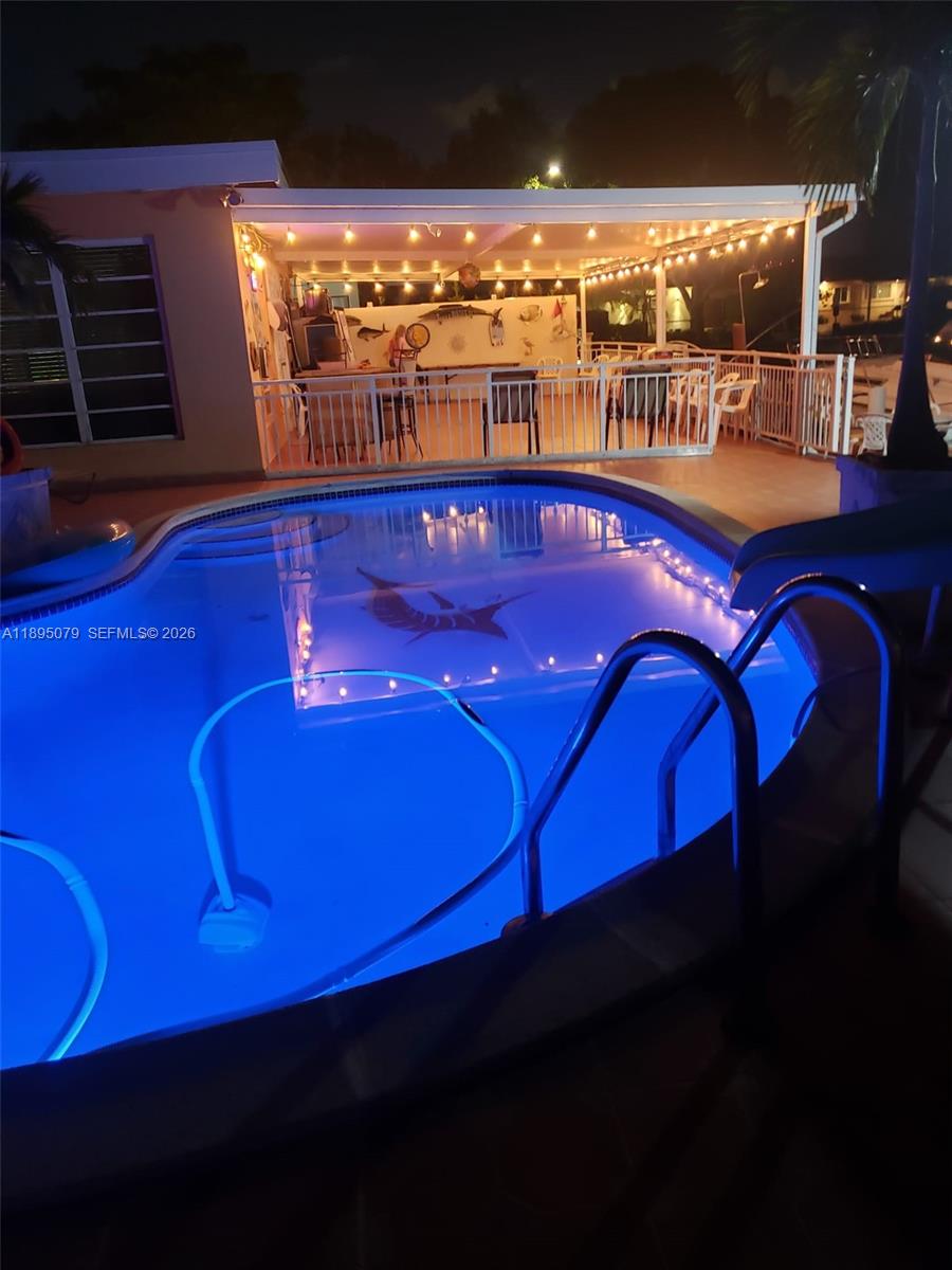12941 Auralia Road North Miami, FL 33181 - Photo 11 of 32 a view of a balcony with city view