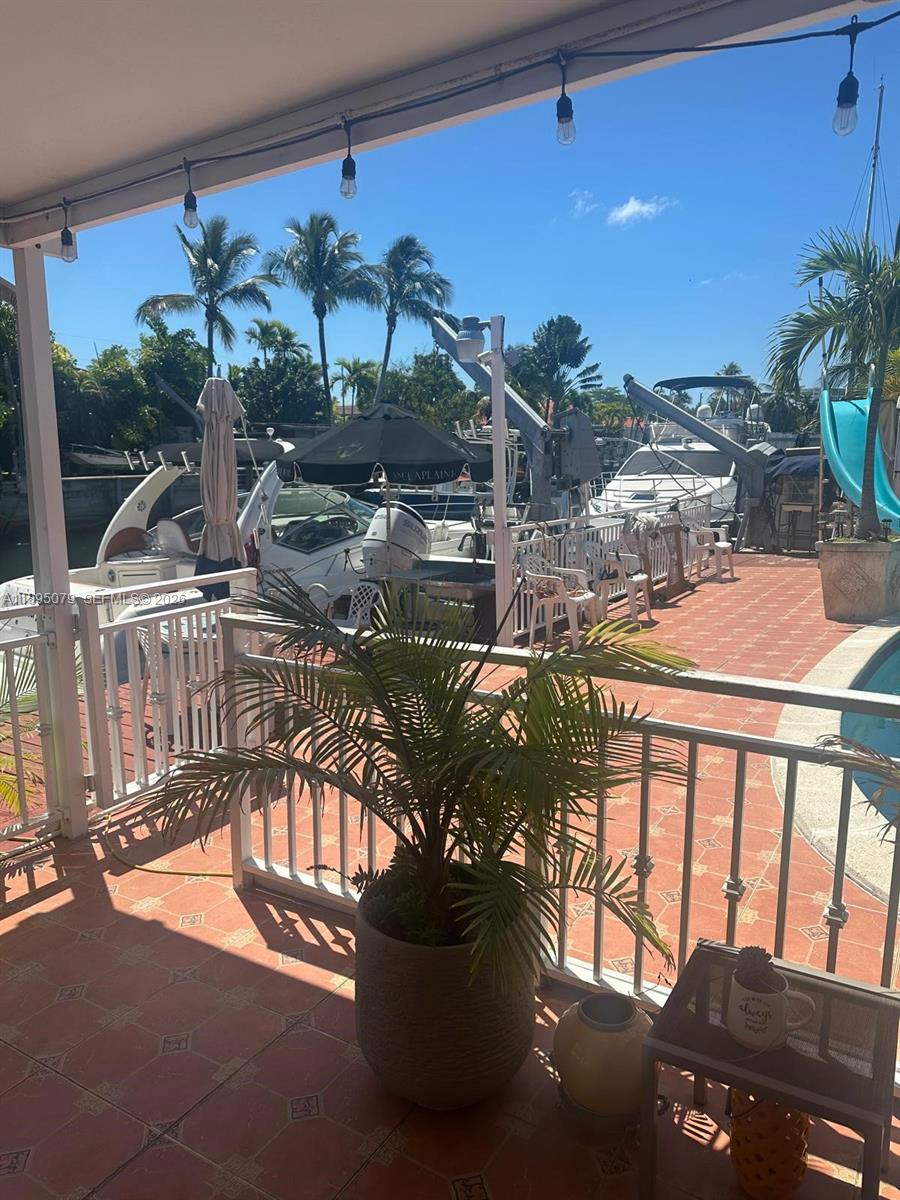 12941 Auralia Road North Miami, FL 33181 - Photo 21 of 32 a view of balcony with furniture
