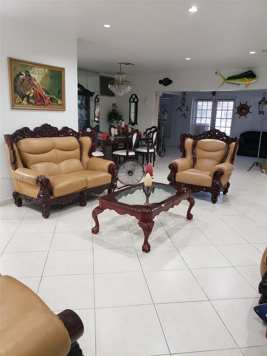 12941 Auralia Road North Miami, FL 33181 - Photo 28 of 32 a living room with furniture