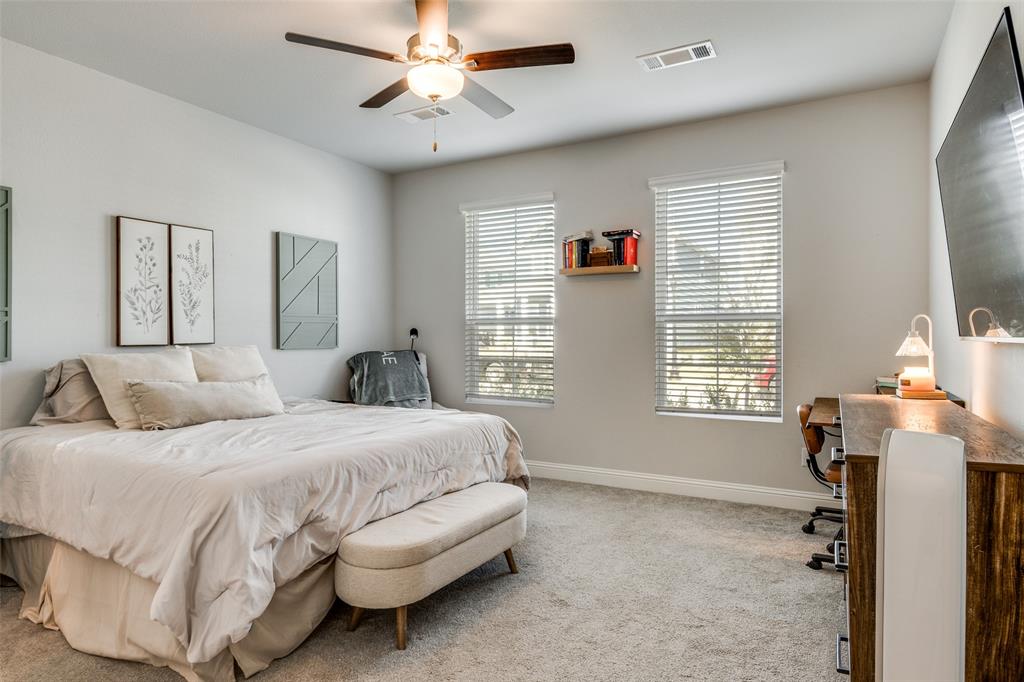 8413 Alba Lane Rowlett, TX 75089 - Photo 14 of 25 Bedroom featuring carpet flooring, a desk, and ceiling fan