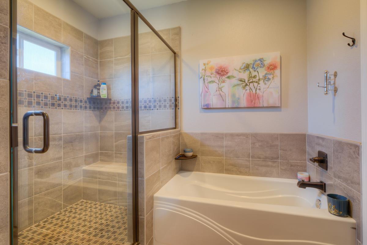 83 Northfork Road Berry Creek, CA 95916 - Photo 41 of 56 a bathroom with a bathtub and a shower