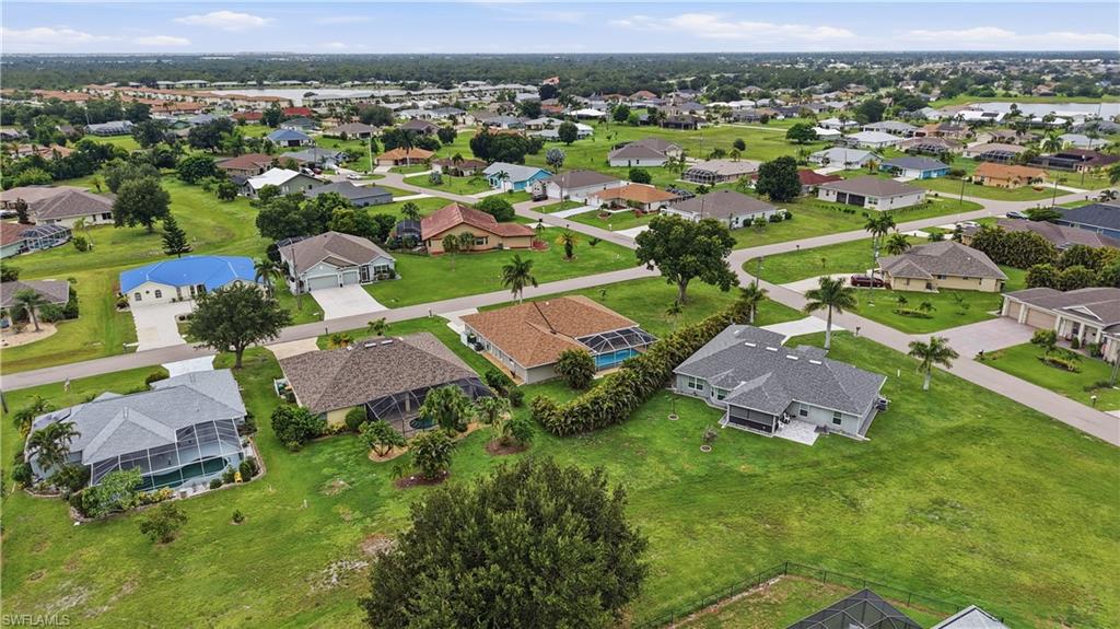 25378 Rupert Road Punta Gorda, FL 33983 - Photo 50 of 50 Expansive residential community featuring a variety of single-story homes with diverse architectural styles, screened pool enclosures, and mature landscaping