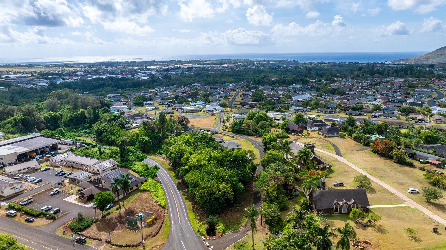 2804 Wehe Road Lihue, HI 96766 - Photo 14 of 29 an aerial view of a city with lots of residential buildings