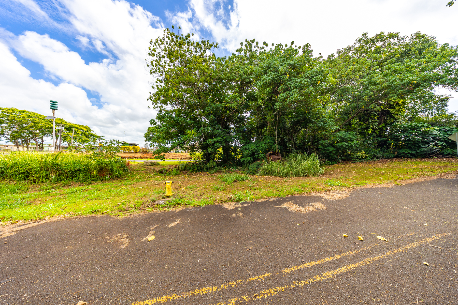 2804 Wehe Road Lihue, HI 96766 - Photo 21 of 29 a view of a swimming pool with an outdoor space and seating area