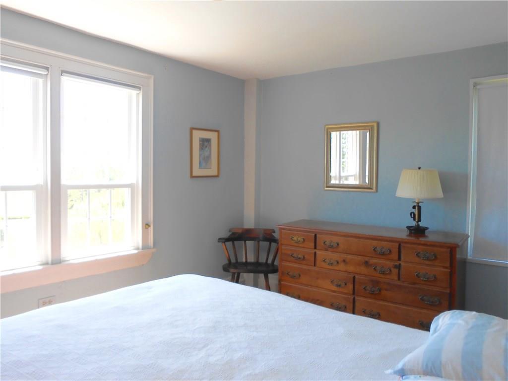 3 River House Road Castine, ME 04421 - Photo 16 of 26 Bedroom has views that look out to...