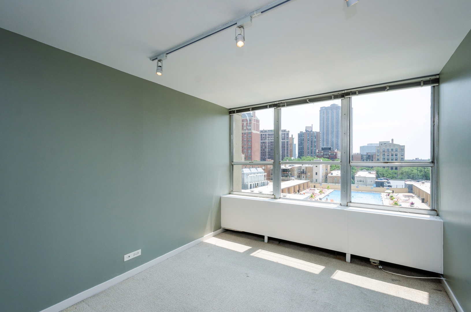 655 West Irving Park Road, Unit 407 Chicago, IL 60613 - Photo 7 of 31 a view of a room with a large window