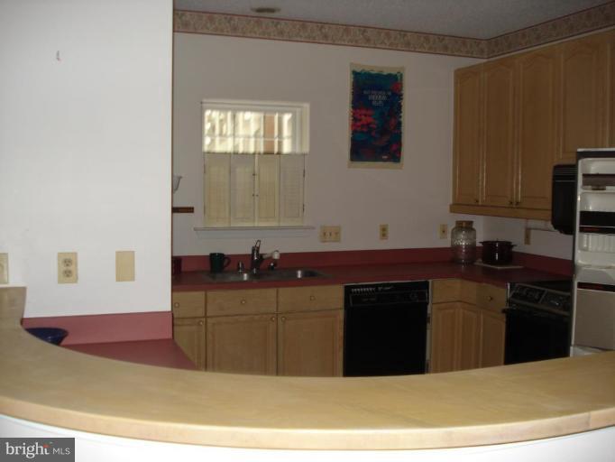 126 Square Rigger Way, Unit 126 Solomons, MD 20688 - Photo 3 of 8 Kitchen