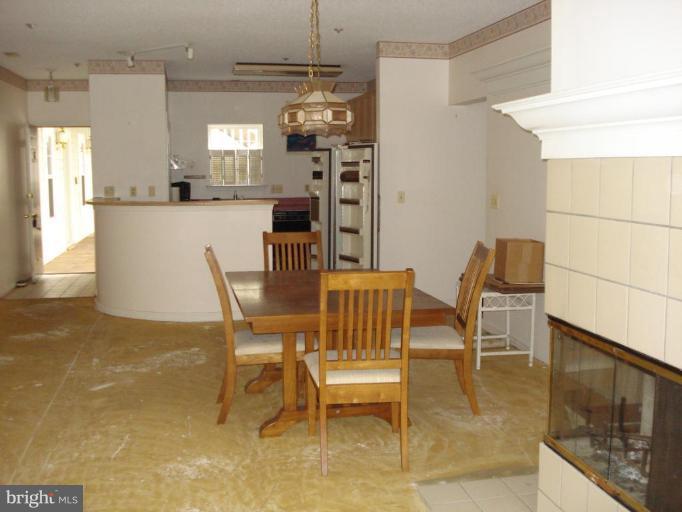 126 Square Rigger Way, Unit 126 Solomons, MD 20688 - Photo 5 of 8 Dining Area