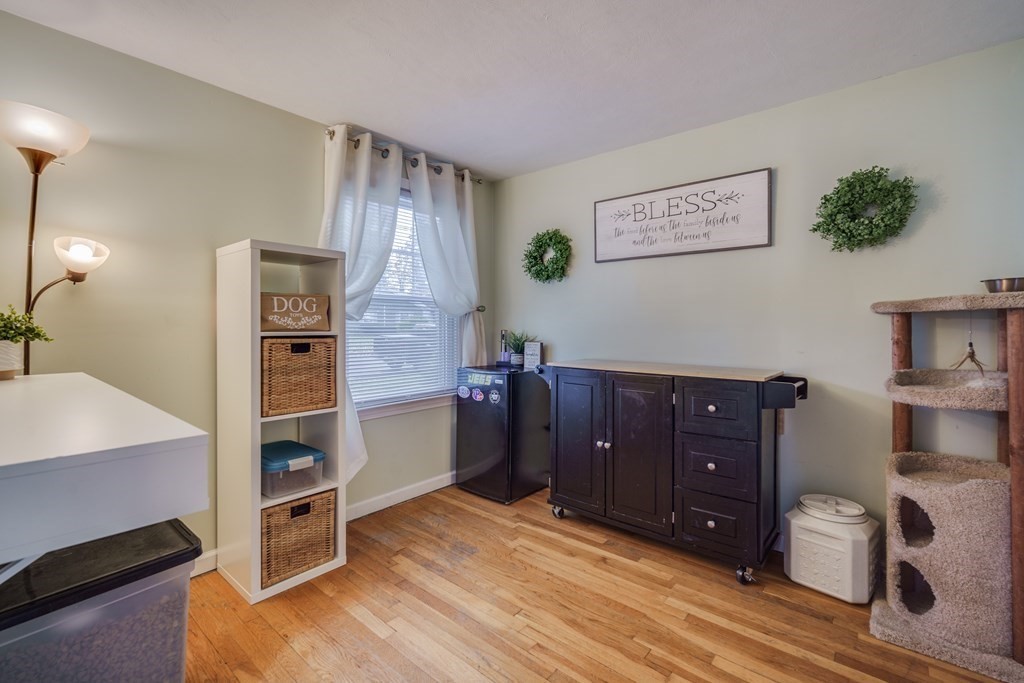 76 Wilshire Road Springfield, MA 01118 - Photo 17 of 34 a room with furniture and wooden floor