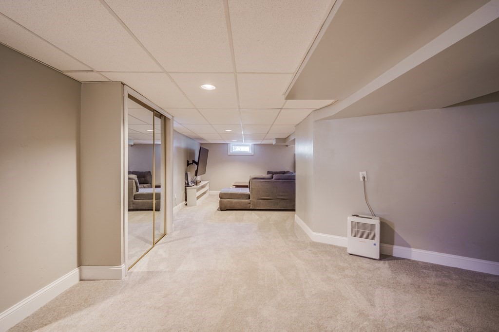 76 Wilshire Road Springfield, MA 01118 - Photo 21 of 34 a view of a hallway with closet and a window
