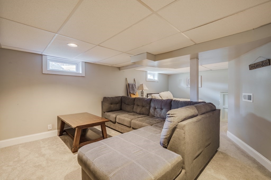 76 Wilshire Road Springfield, MA 01118 - Photo 24 of 34 a living room with furniture and a ceiling fan