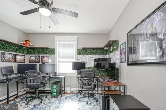 a living room with furniture a window and a fireplace
