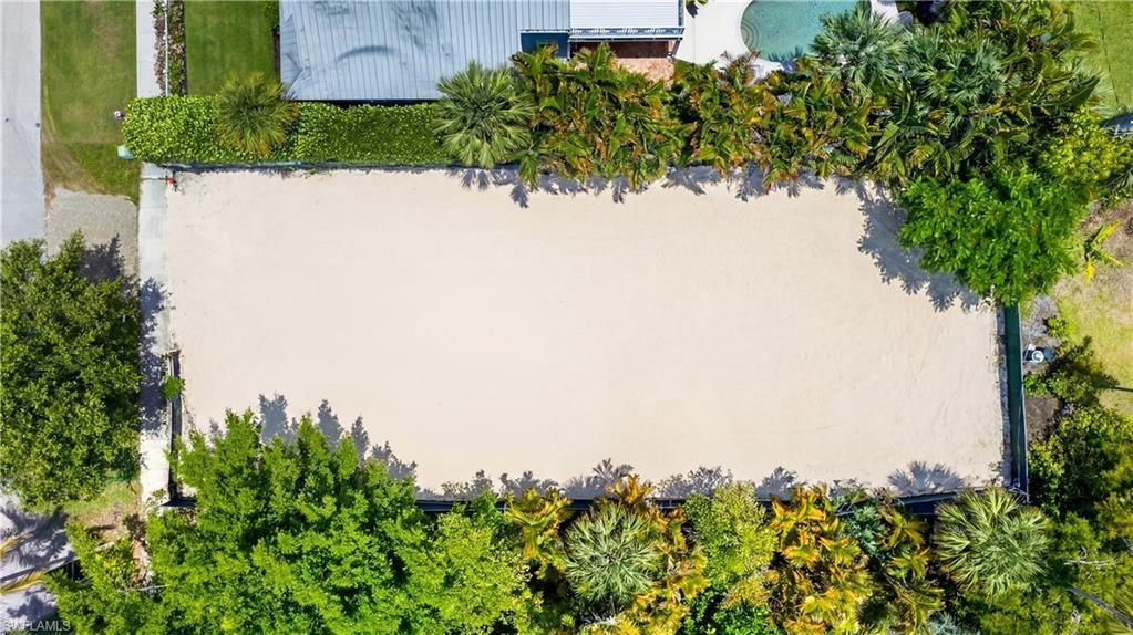 61 4th Street South Naples, FL 34102 - Photo 6 of 6 an aerial view of a house with a yard