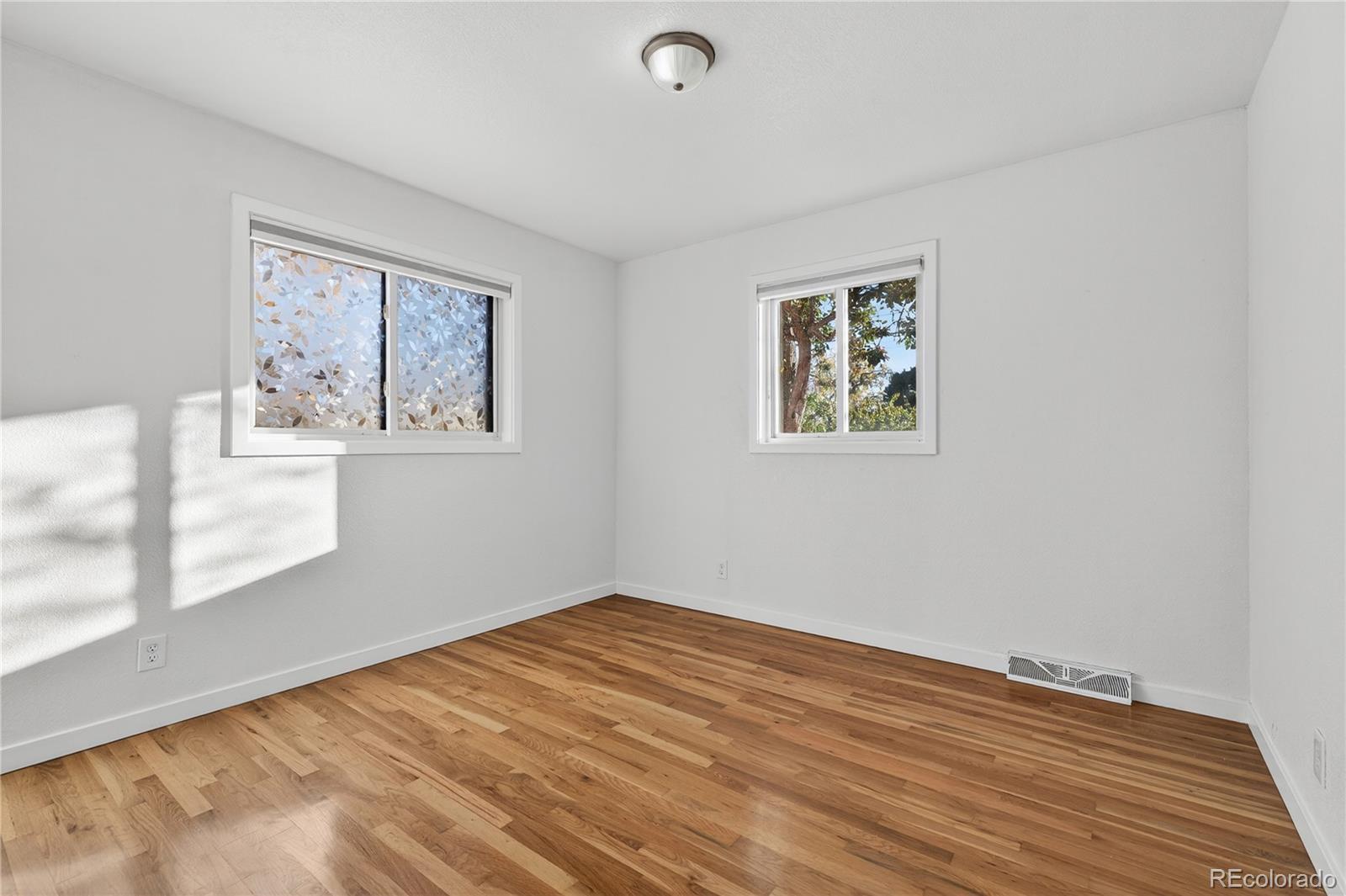 450 South 40th Street Boulder, CO 80305 - Photo 15 of 36 a view of room with window and hardwood floor