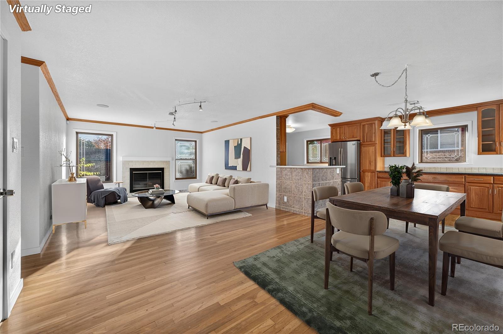 450 South 40th Street Boulder, CO 80305 - Photo 3 of 36 a living room with furniture a fireplace and a table