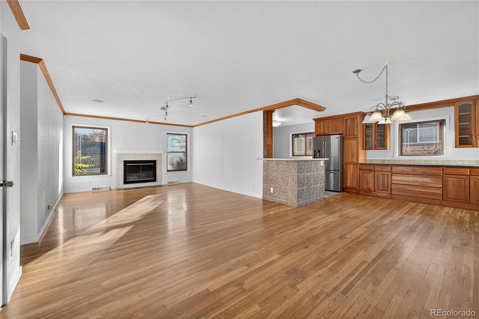 450 South 40th Street Boulder, CO 80305 - Photo 6 of 36 a view of living room with furniture and fireplace