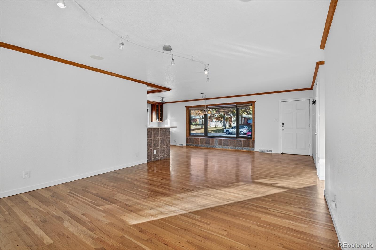 450 South 40th Street Boulder, CO 80305 - Photo 9 of 36 wooden floor in an empty room with a window