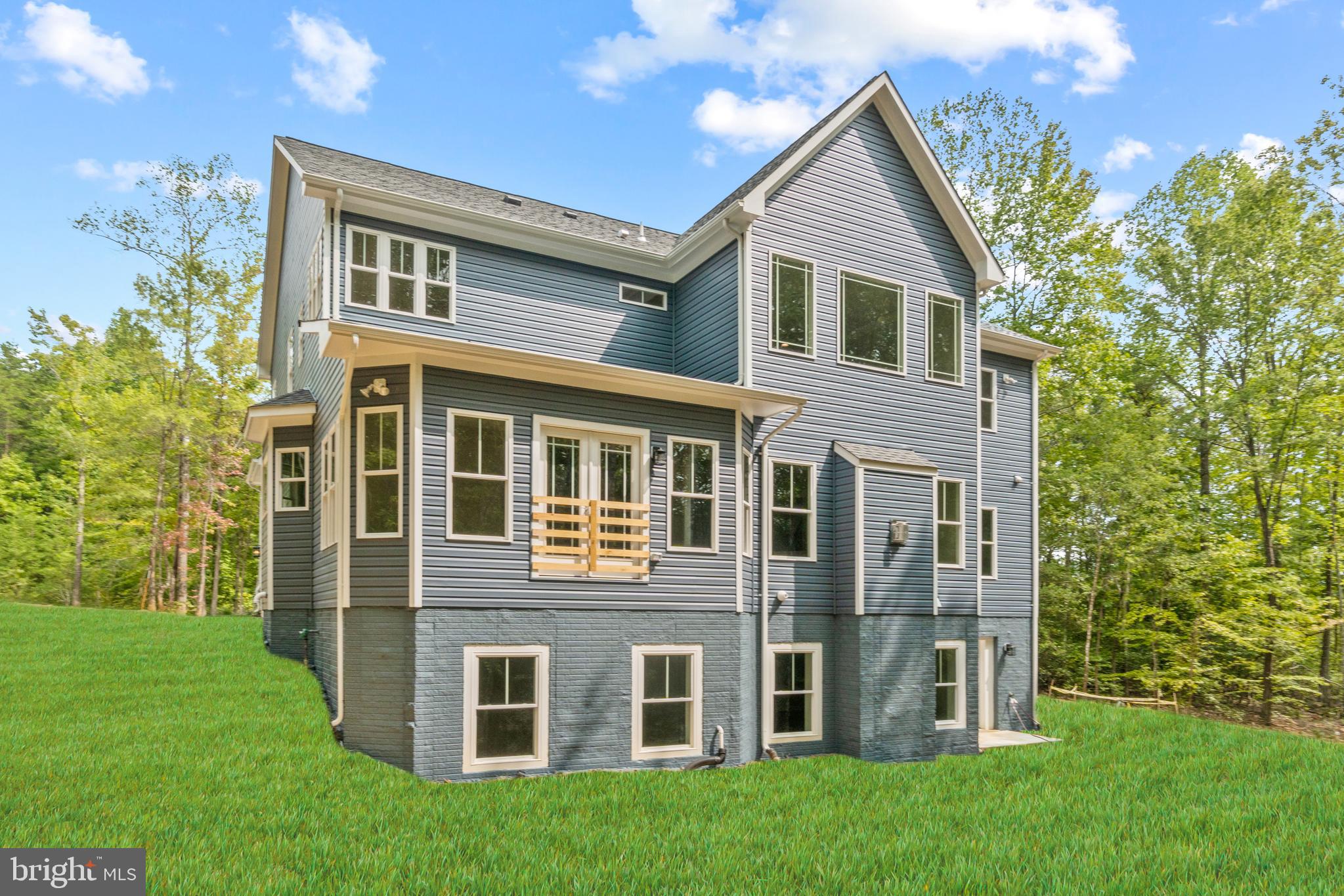 13741 Orlando Road Nokesville, VA 20181 - Photo 4 of 41 a view of a house with a yard