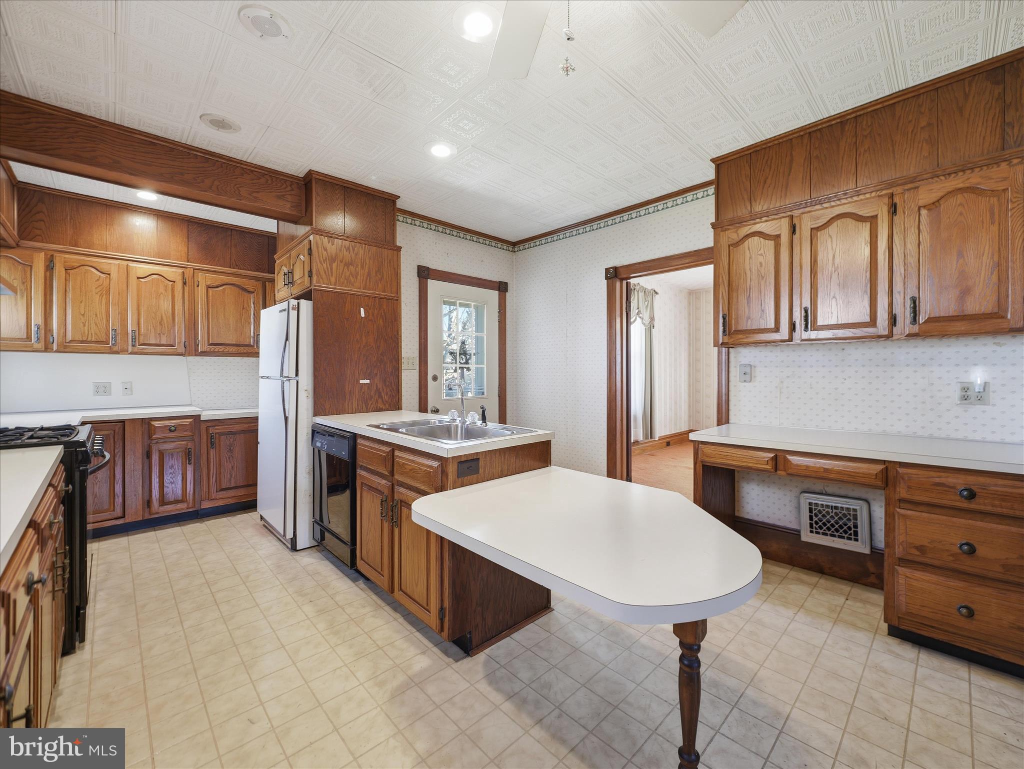 231 Fairview Avenue Waynesboro, PA 17268 - Photo 16 of 45 a kitchen with stainless steel appliances a sink and a refrigerator