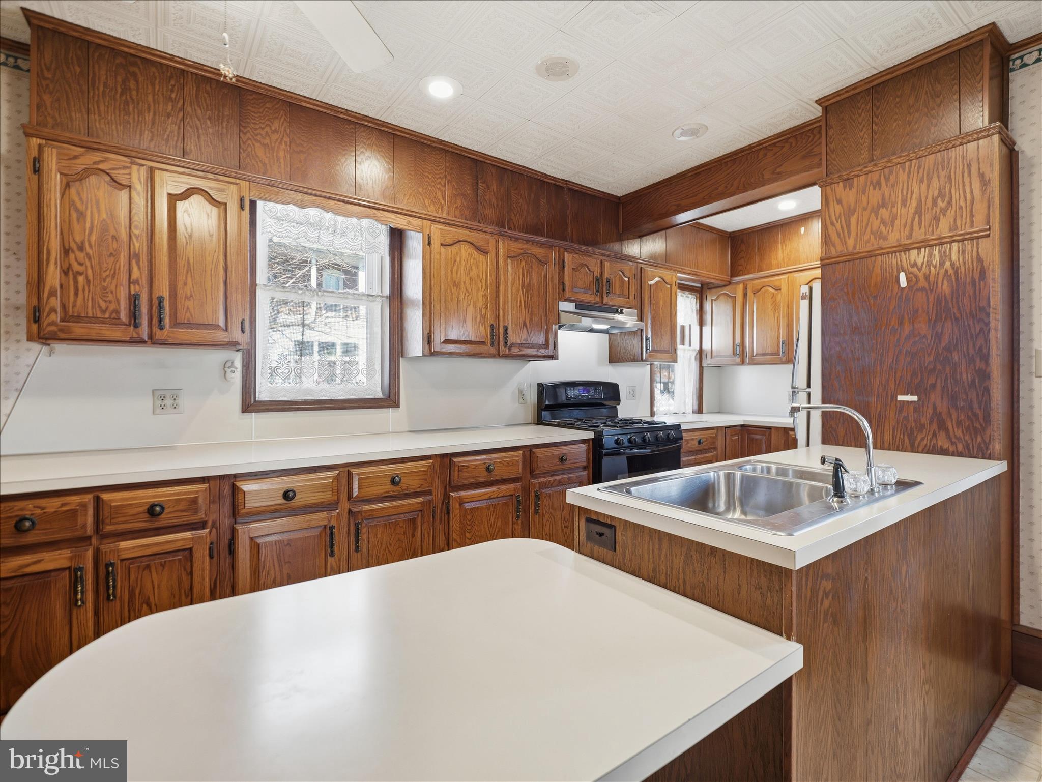 231 Fairview Avenue Waynesboro, PA 17268 - Photo 17 of 45 a kitchen with stainless steel appliances a sink a stove and a refrigerator
