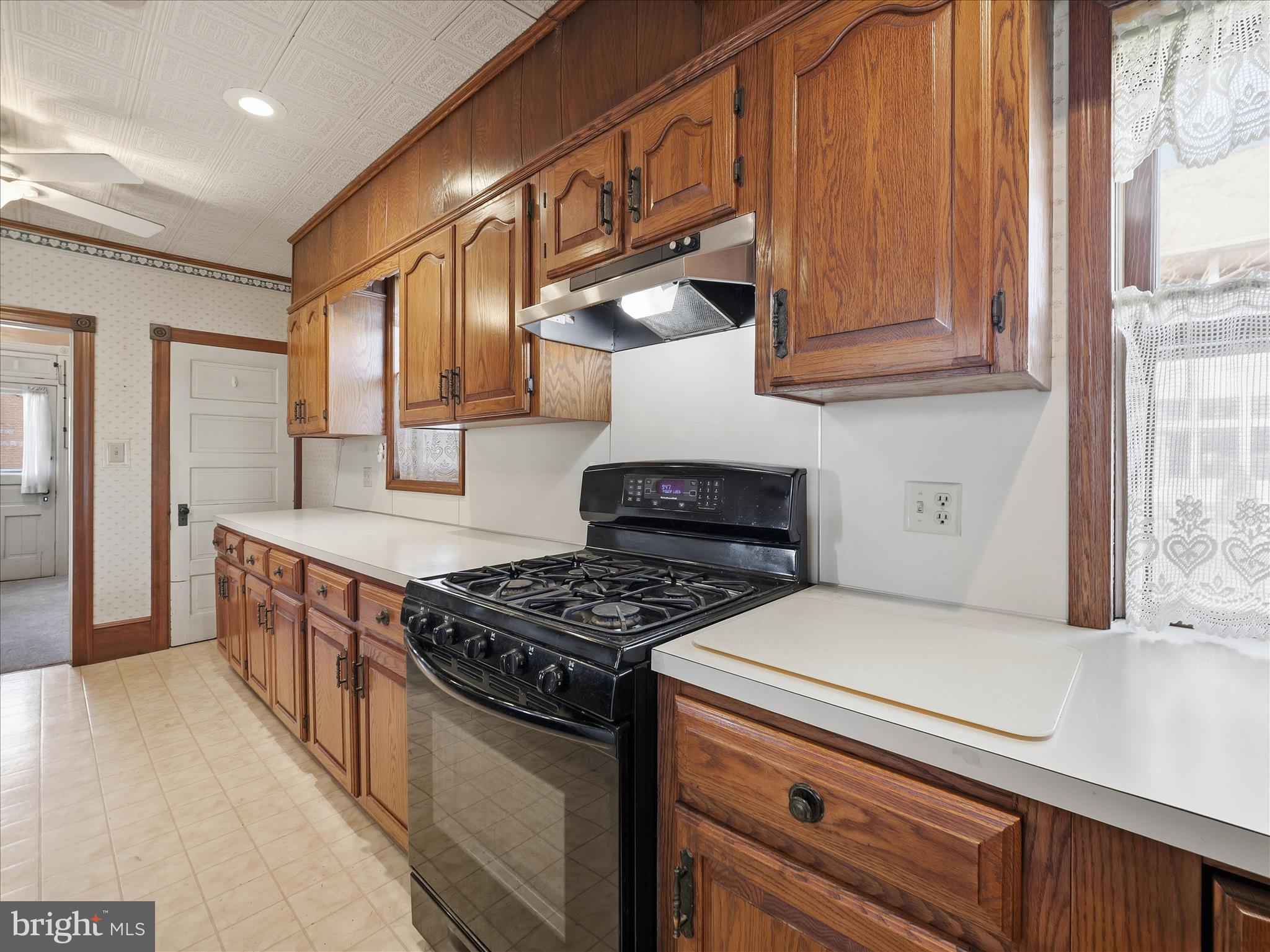 231 Fairview Avenue Waynesboro, PA 17268 - Photo 18 of 45 a kitchen with stainless steel appliances granite countertop a stove and a sink