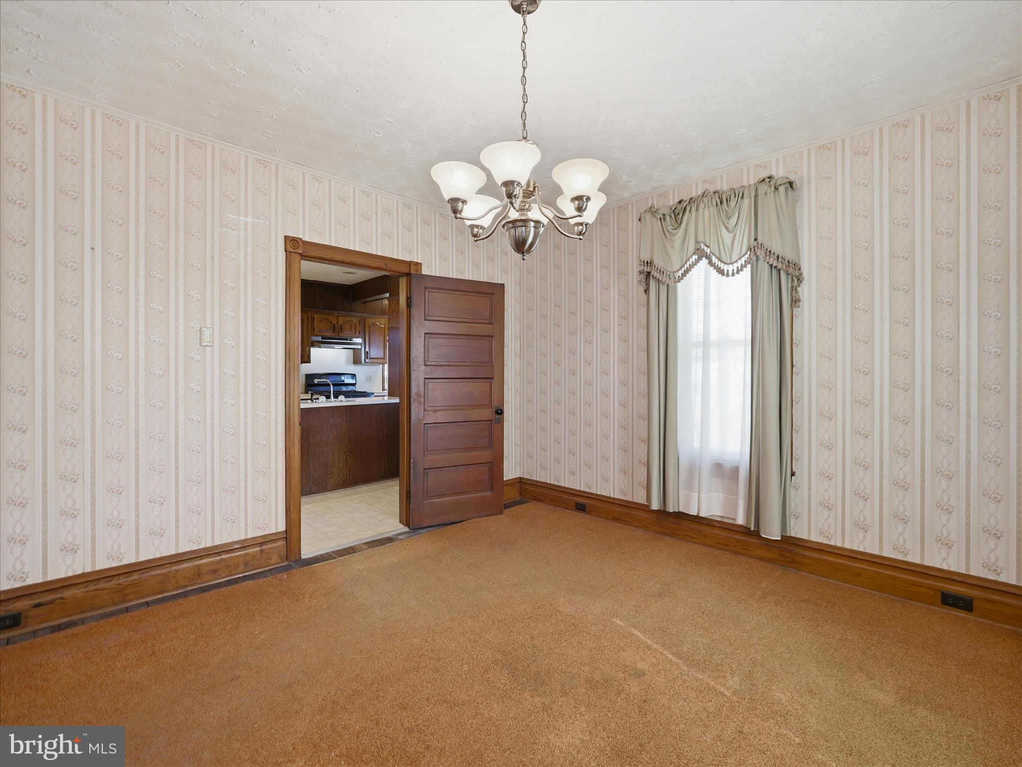 231 Fairview Avenue Waynesboro, PA 17268 - Photo 21 of 45 a view of a chandelier in big room and chandelier fan