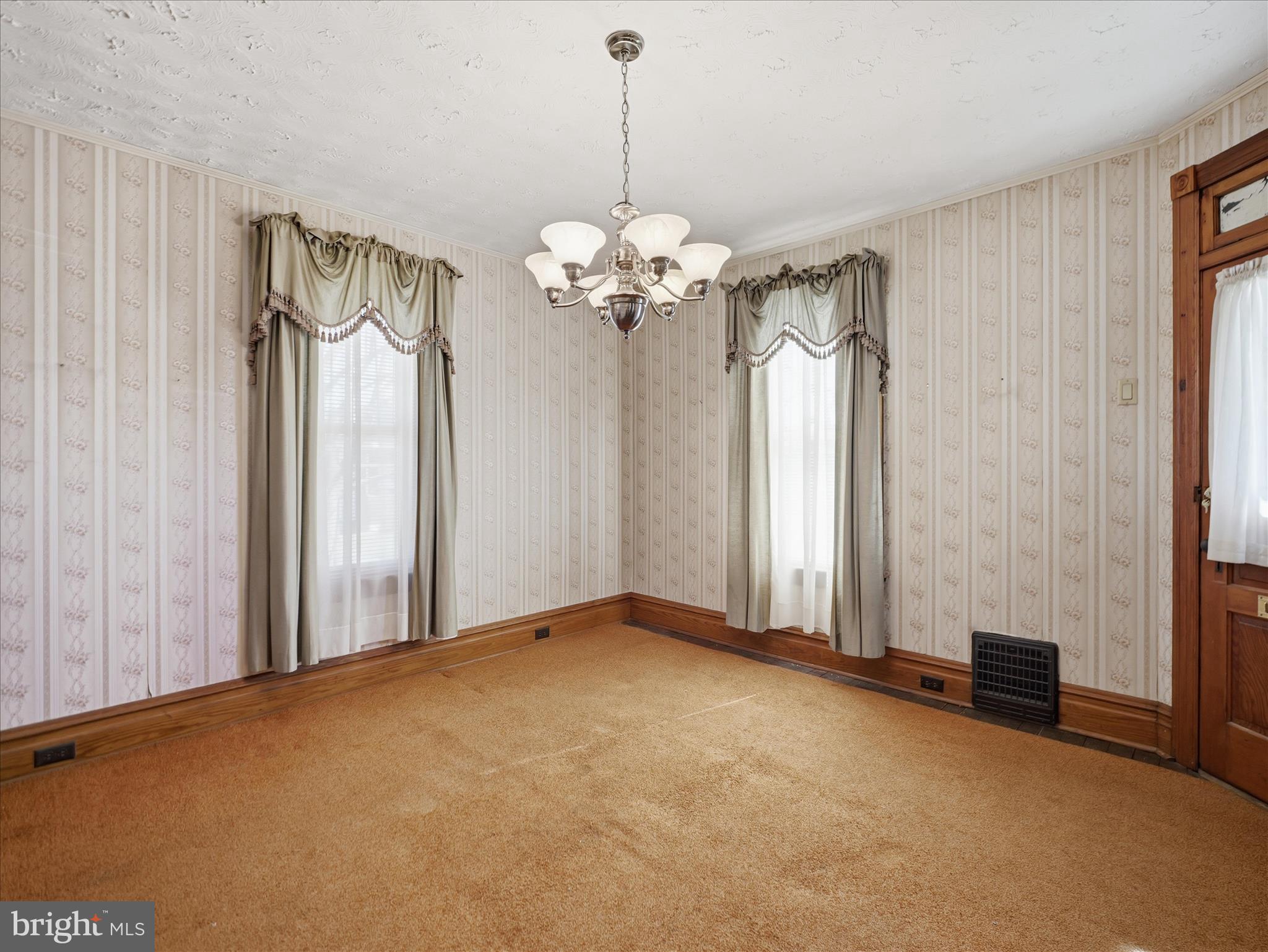 231 Fairview Avenue Waynesboro, PA 17268 - Photo 22 of 45 a view of a livingroom with a chandelier fan and windows
