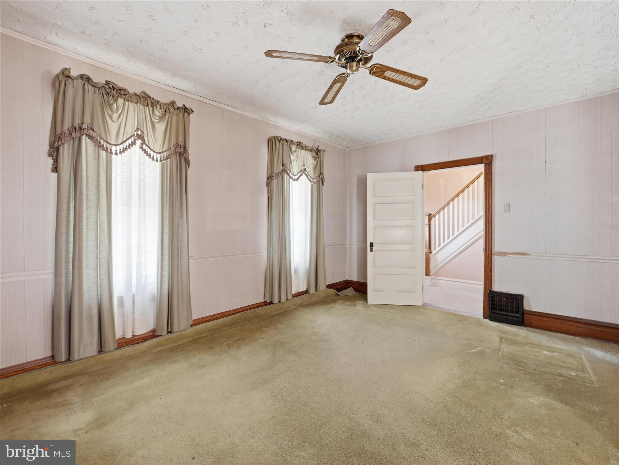 231 Fairview Avenue Waynesboro, PA 17268 - Photo 26 of 45 an empty room with windows and fan