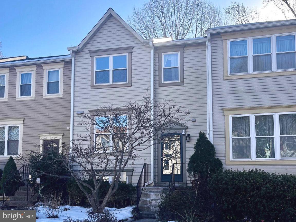 33 Kinsman View Circle Silver Spring, MD 20901 - Photo 2 of 26 a front view of a house with garden