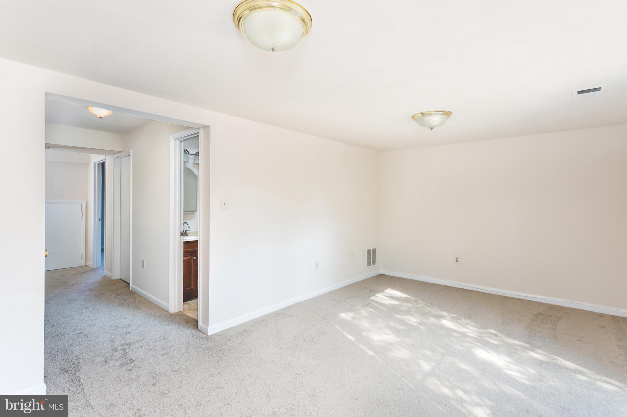 33 Kinsman View Circle Silver Spring, MD 20901 - Photo 22 of 26 a view of an empty room