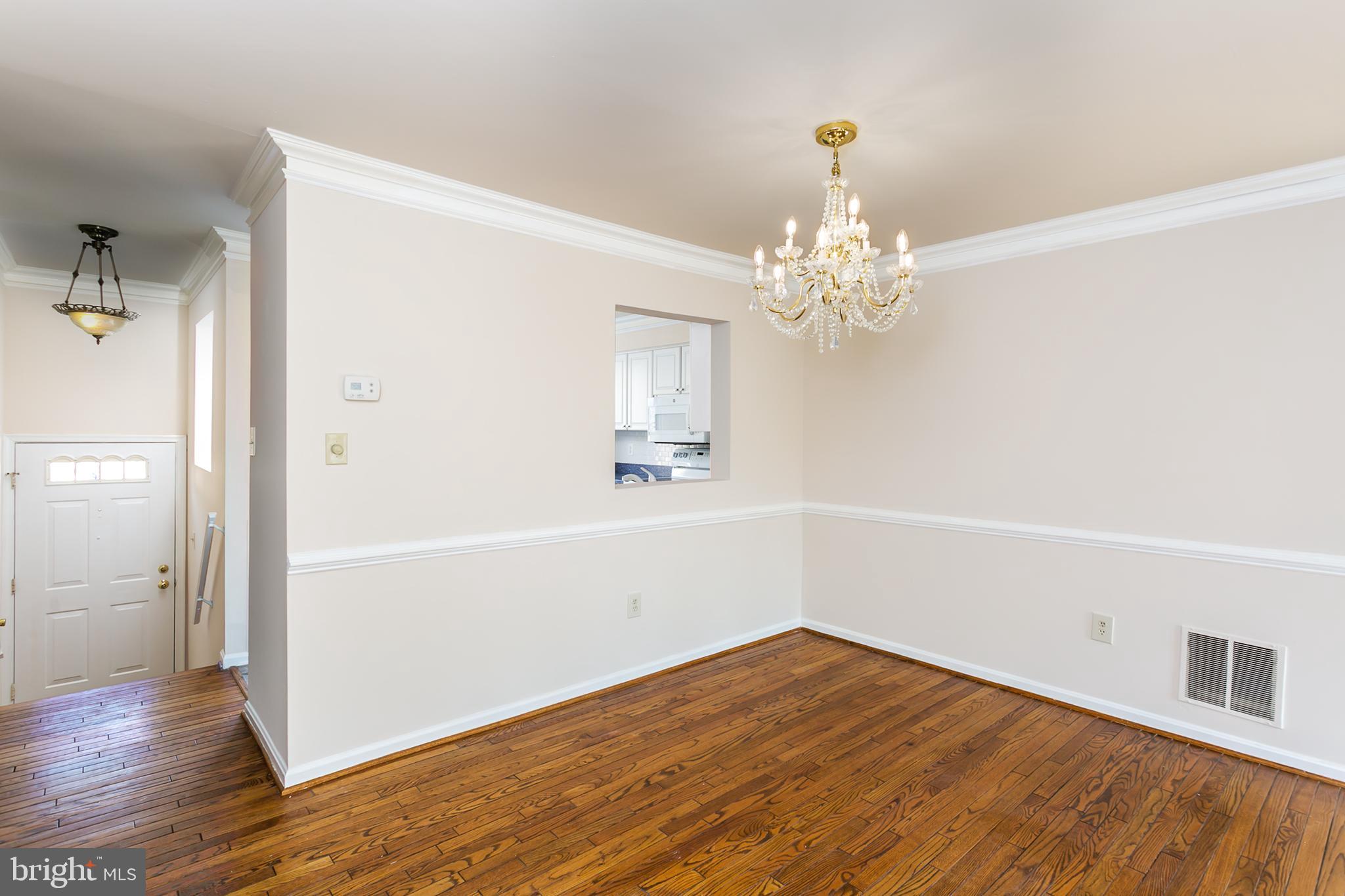 33 Kinsman View Circle Silver Spring, MD 20901 - Photo 5 of 26 wooden floor in an empty room