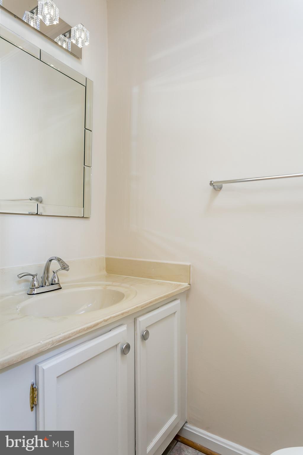 33 Kinsman View Circle Silver Spring, MD 20901 - Photo 10 of 26 a bathroom with a sink and vanity