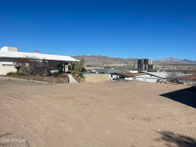 a view of a building with trees
