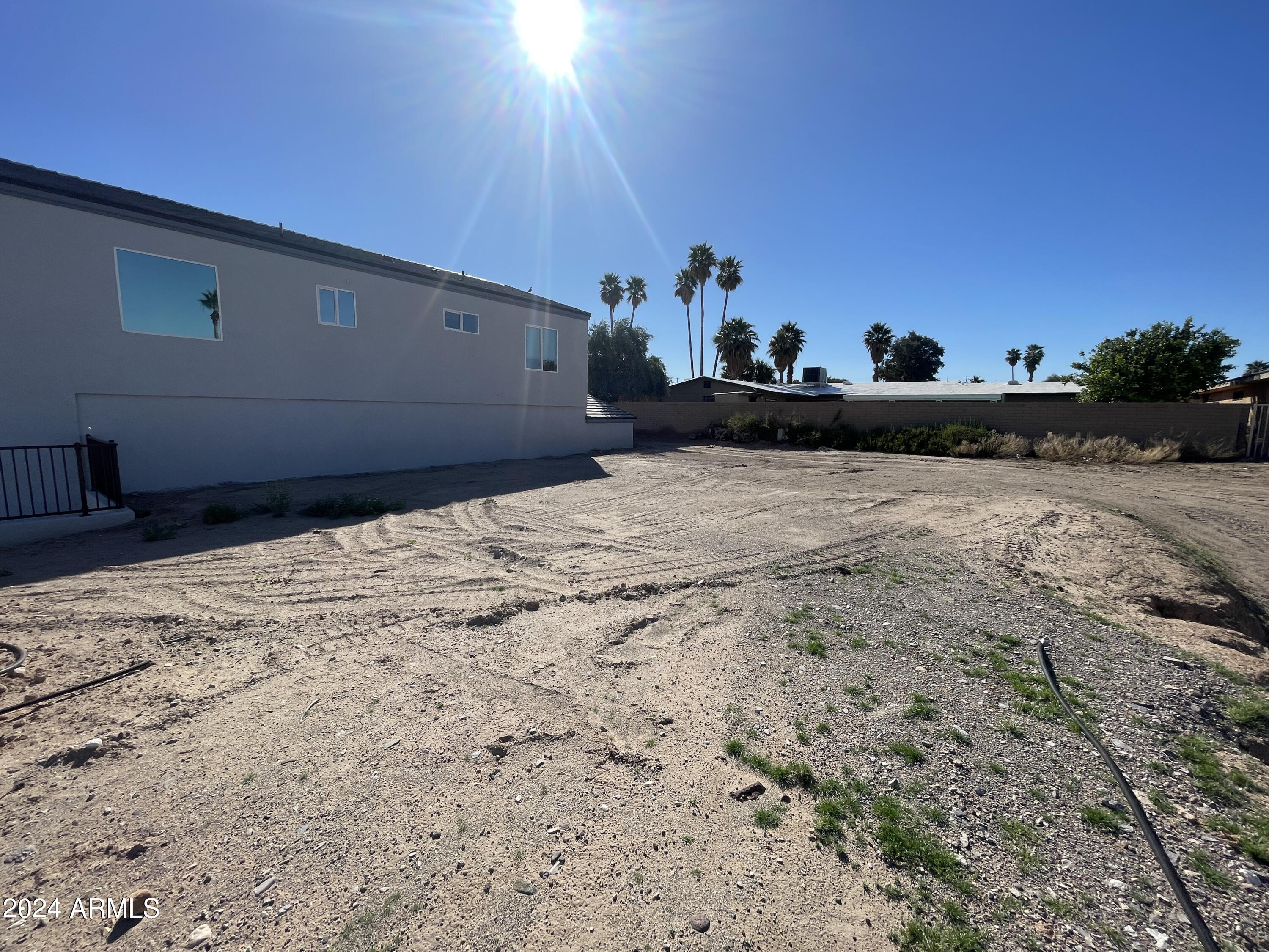 1394 Riverfront Drive, Unit 66 Bullhead City, AZ 86442 - Photo 5 of 11 a view of a backyard of the house