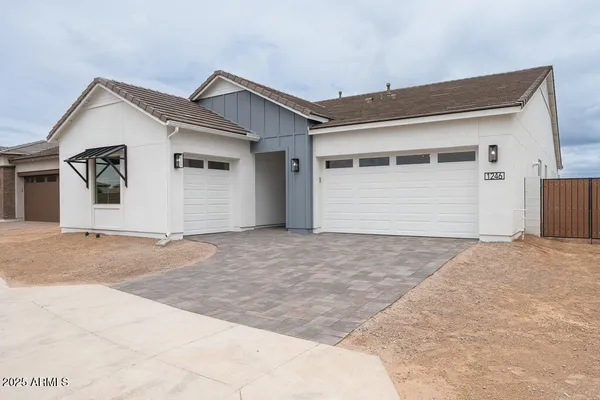 a view of garage and yard