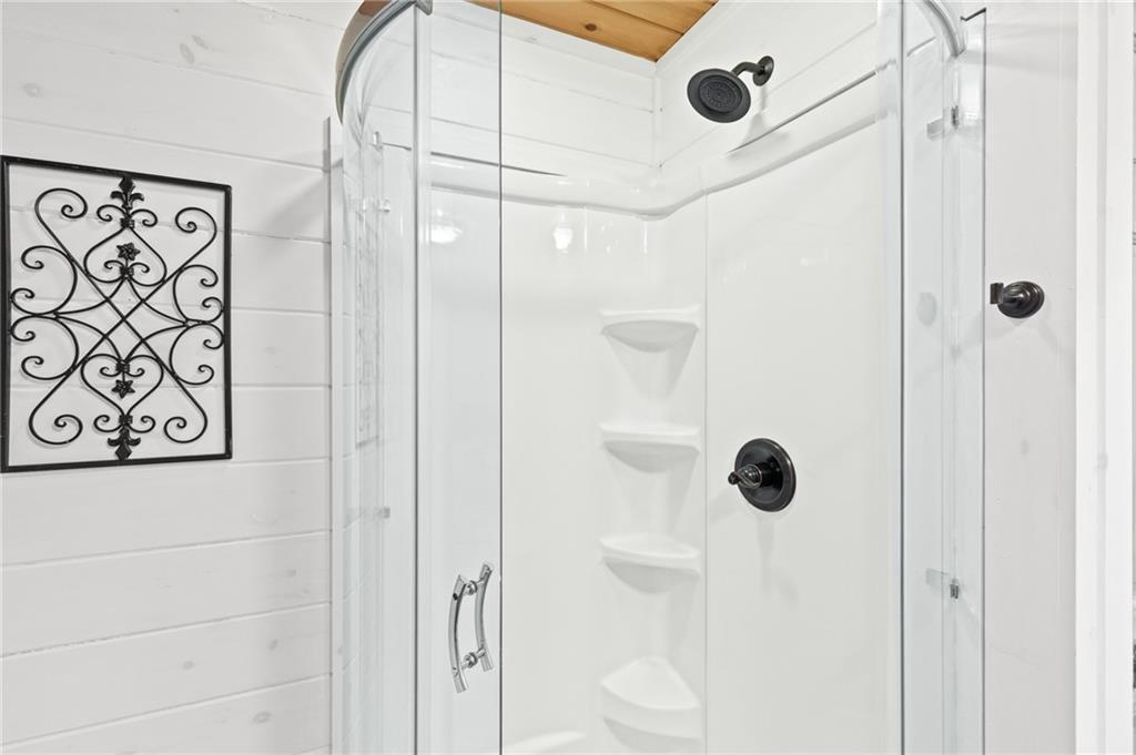 129 Old Bend Road Blue Ridge, GA 30513 - Photo 16 of 44 a bathroom with a shower