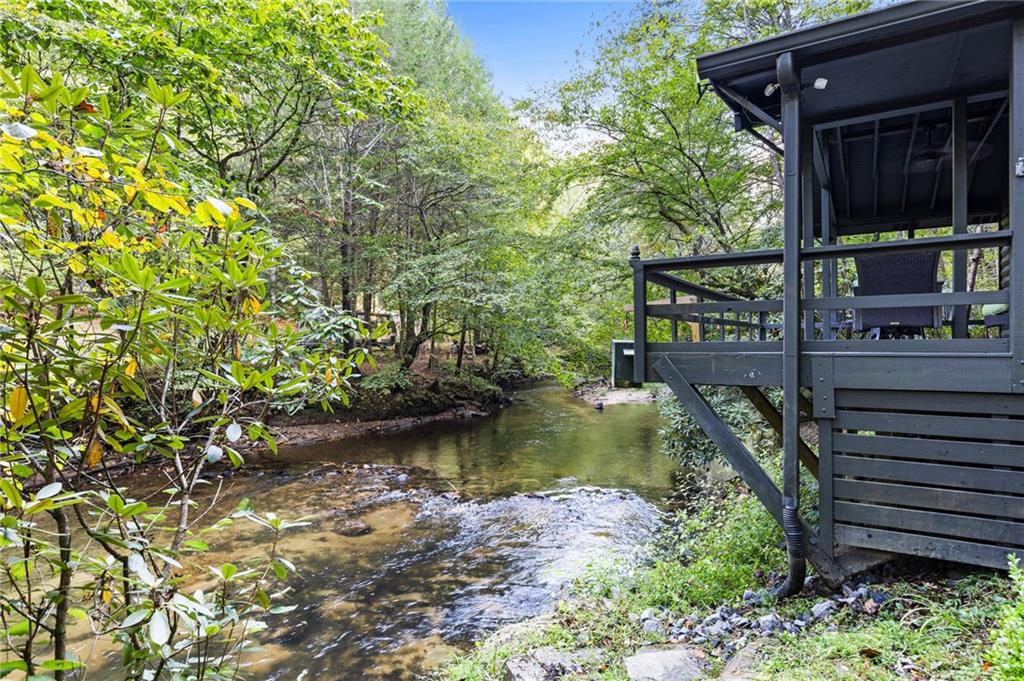 129 Old Bend Road Blue Ridge, GA 30513 - Photo 29 of 44 a view of a backyard of the house