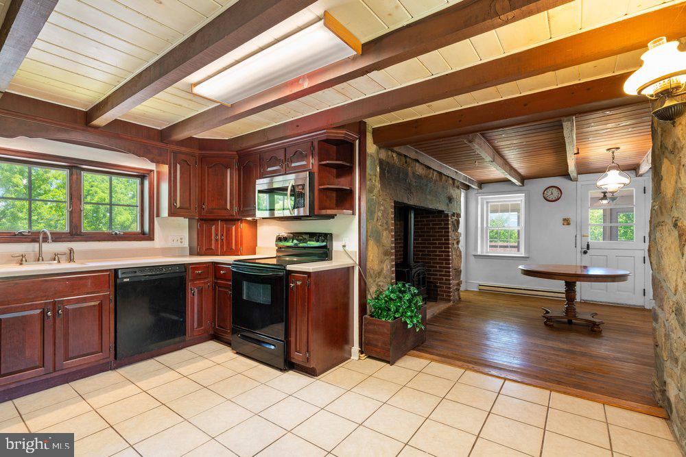 201 East Moyer Road Pottstown, PA 19464 - Photo 22 of 64 a kitchen with sink cabinets and outdoor view