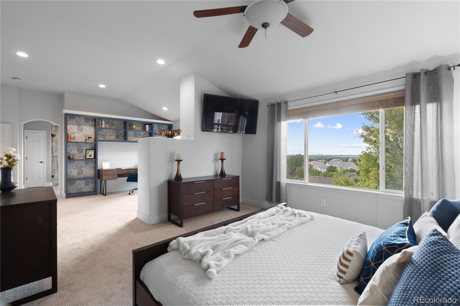 6261 South Sicily Way Aurora, CO 80016 - Photo 30 of 50 a bed room with a bed and a television