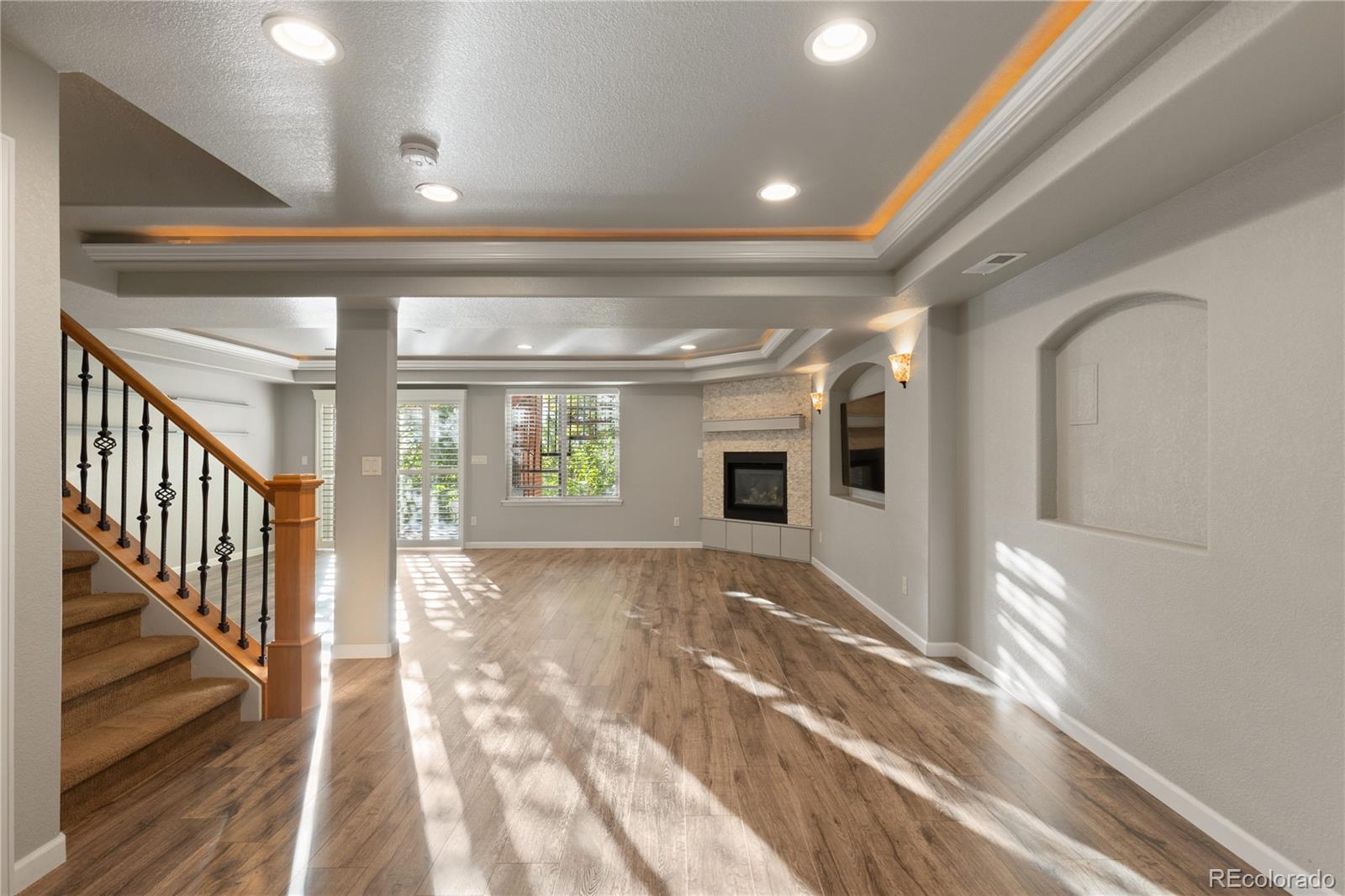 6261 South Sicily Way Aurora, CO 80016 - Photo 42 of 50 a view of hallway with wooden floor