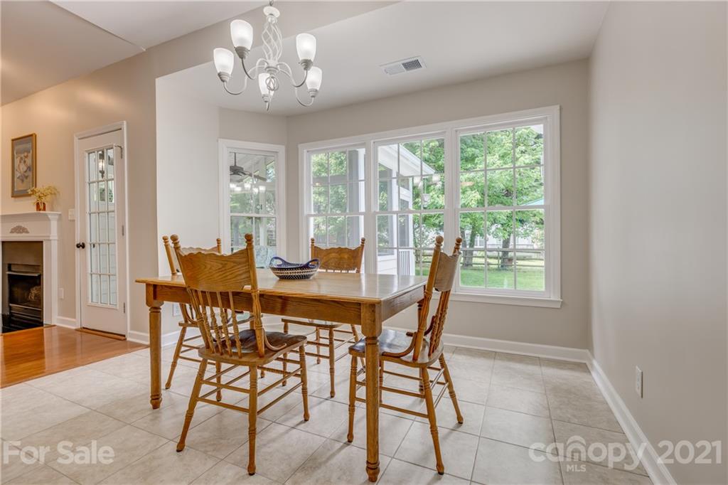 305 Savannah Lane Fort Mill, SC 29708 - Photo 17 of 46 a view of a dining room with furniture window and outside view