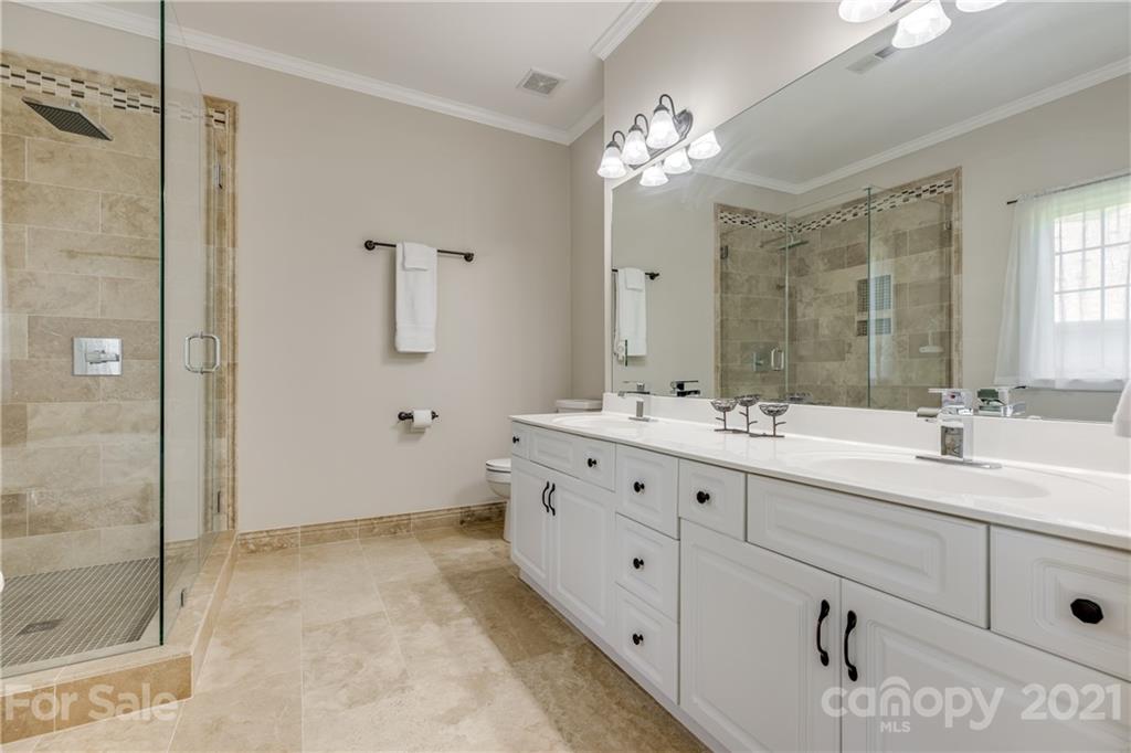 305 Savannah Lane Fort Mill, SC 29708 - Photo 23 of 46 a bathroom with a double vanity sink mirror and shower