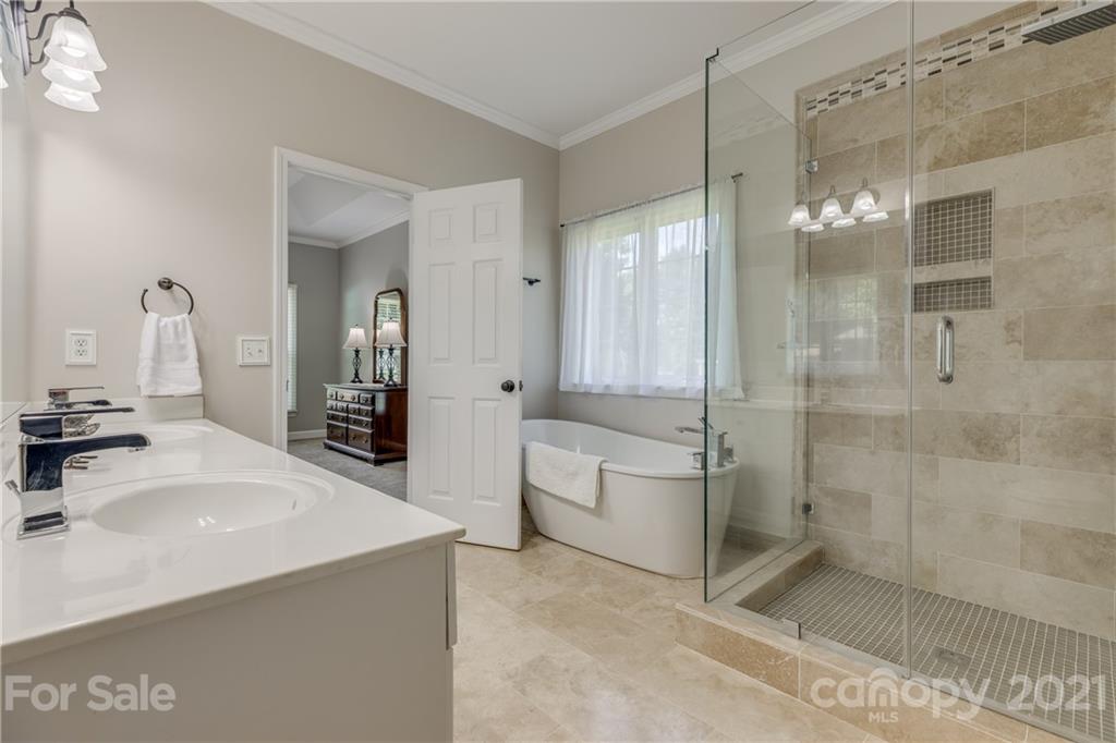 305 Savannah Lane Fort Mill, SC 29708 - Photo 24 of 46 a bathroom with a tub shower sink and mirror