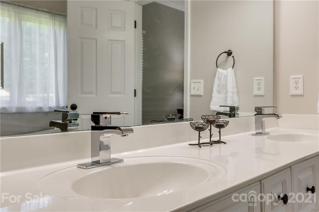 305 Savannah Lane Fort Mill, SC 29708 - Photo 25 of 46 a bathroom with a sink and a tub
