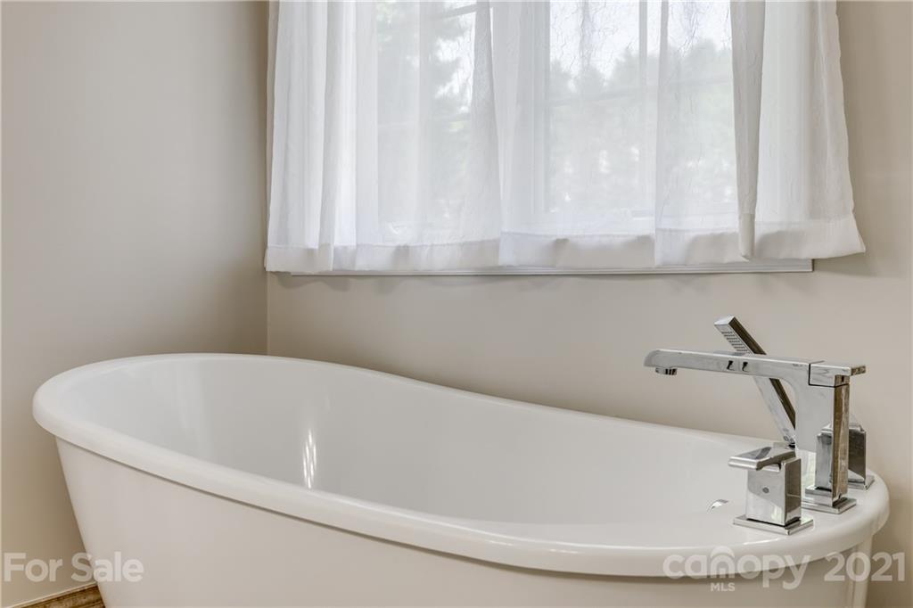 305 Savannah Lane Fort Mill, SC 29708 - Photo 26 of 46 a white bath tub sitting in a bathroom