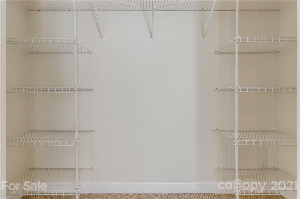 305 Savannah Lane Fort Mill, SC 29708 - Photo 31 of 46 a bathroom with a glass shower door