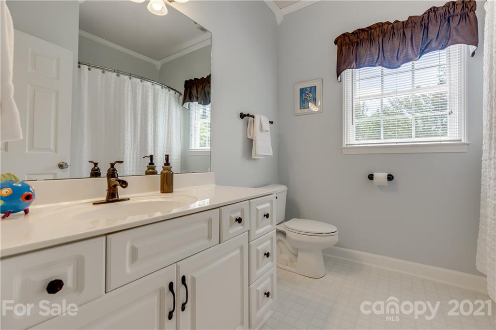 305 Savannah Lane Fort Mill, SC 29708 - Photo 35 of 46 a bathroom with a toilet sink and mirror